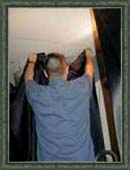 Mike hangs up his (one) piece of fabric